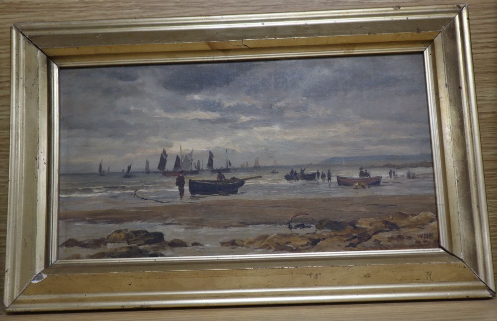 WMB c.1900, oil on board, Fishing boats at low tide, initialled, 17 x 31cm